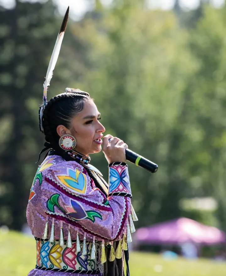 An Indigenous performer singing during the 2025 festival